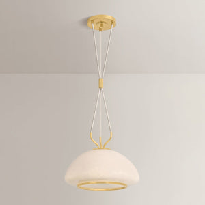 Baudette Pendant 14.25" in aged brass shown from the front to reveal the shade shape and metal detail.