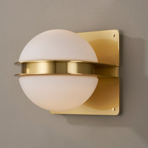 Rudolf Wall Sconce in aged brass shown from a second angle to highlight the arm curve and shade silhouette.