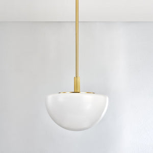 Close-up of the Lethbridge Pendant 19" in aged brass showing the shade shape and metal detail.