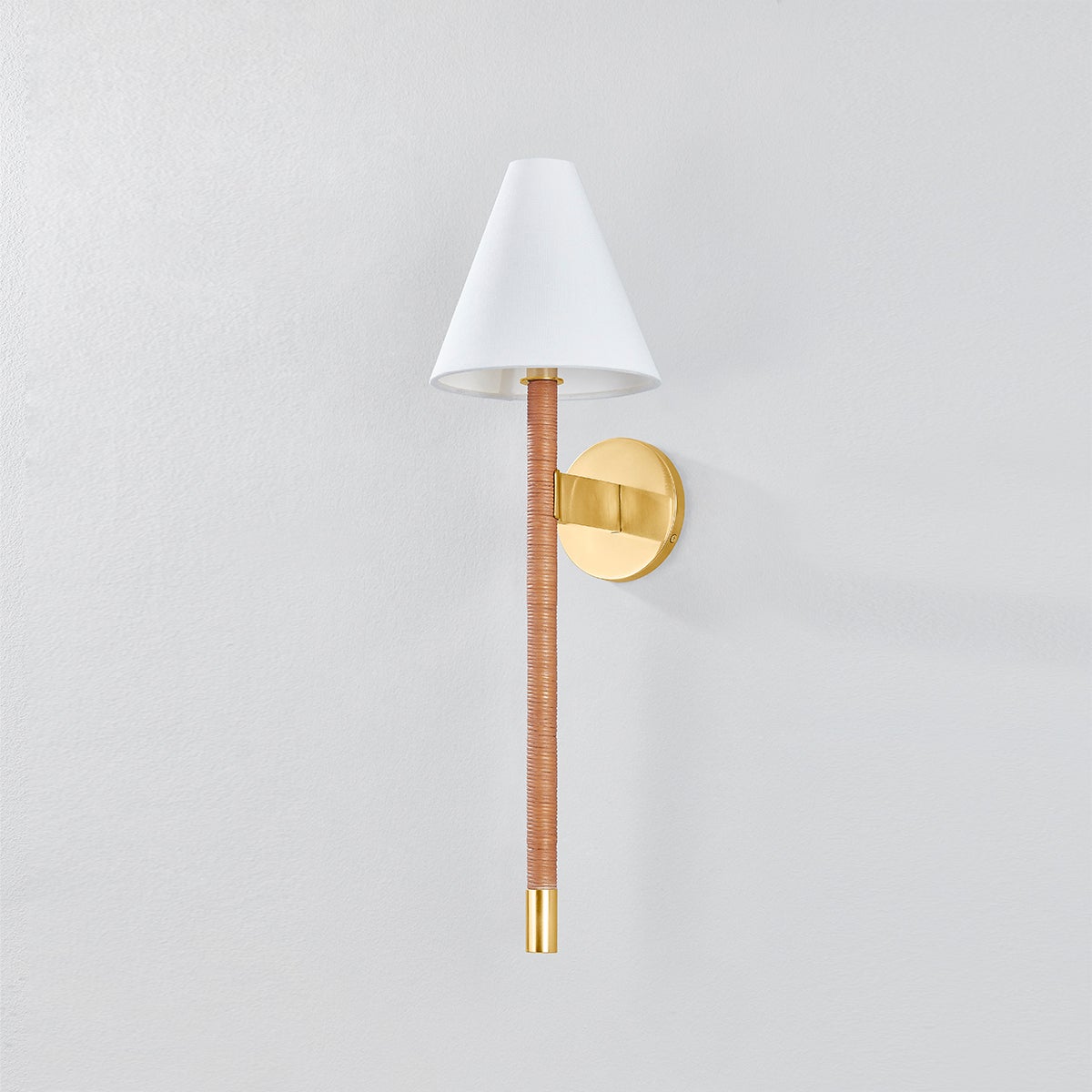 Watkins Wall Sconce in aged brass shown from the front to reveal the arm curve and shade silhouette.