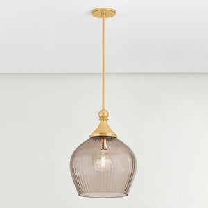 Close-up of the Chatton Pendant 16.5" in aged brass showing the shade shape and metal detail.