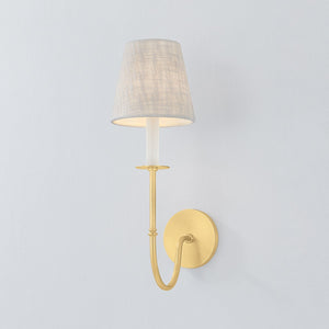 Amina Wall Sconce in aged brass shown from the front to reveal the arm curve and shade silhouette.