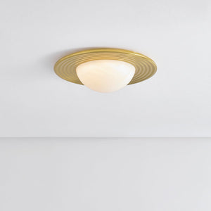 Close-up of the Geraldton Flush Mount 15.75" in aged brass showing the shade profile and mounting canopy.