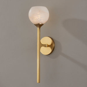 Close-up of the Melton Wall Sconce 1-Light 5" x 18.5" in aged brass showing the arm curve and shade silhouette.