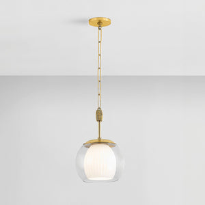Close-up of the Clementon Pendant 11" in aged brass showing the shade shape and metal detail.