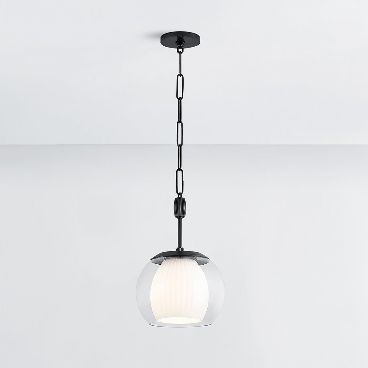 Close-up of the Clementon Pendant 11" in dark bronze showing the shade shape and metal detail.