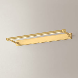 Close-up of the Duell Picture Light 30" in aged brass showing the arm curve and shade proportion.