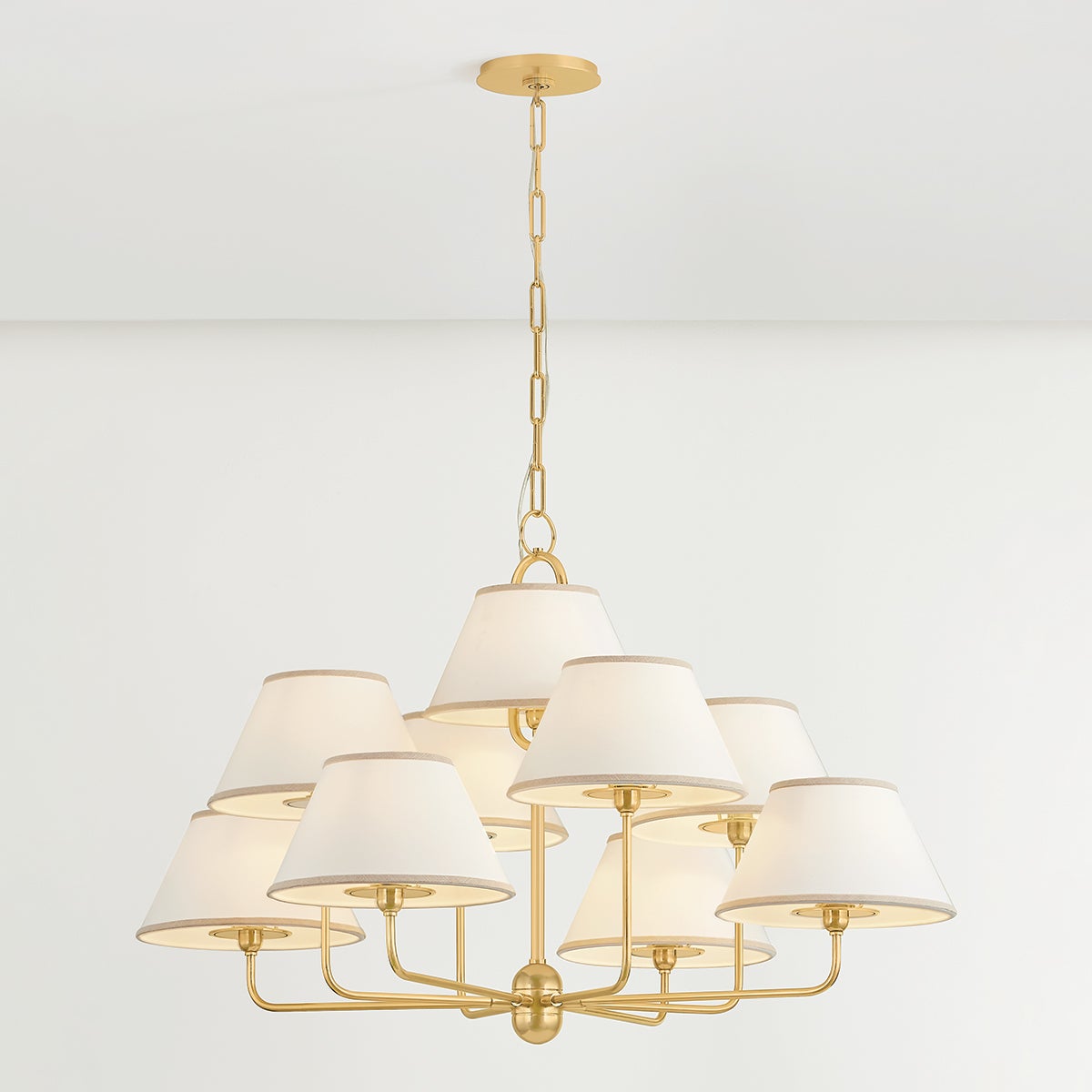 Close-up of the Durland Chandelier 40.5" in aged brass showing the frame, arms, and shade detail.