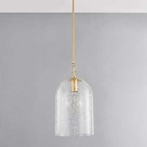 Belleville Pendant 10" in aged brass shown from the front to reveal the shade shape and metal detail.