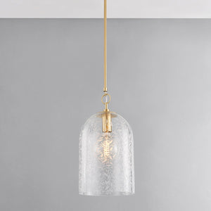 Close-up of the Belleville Pendant 10" in aged brass showing the shade shape and metal detail.