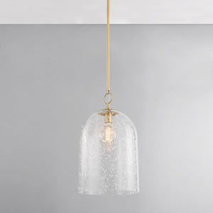 Close-up of the Belleville Pendant 14" in aged brass showing the shade shape and metal detail.