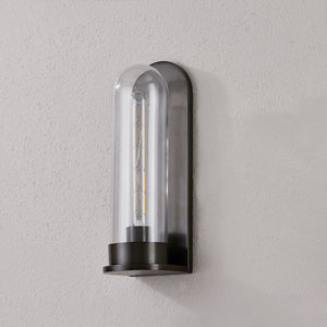 Irwin Wall Sconce in dark bronze shown from the front to reveal the arm curve and shade silhouette.