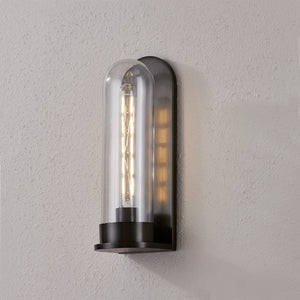Close-up of the Irwin Wall Sconce in dark bronze showing the arm curve and shade silhouette.