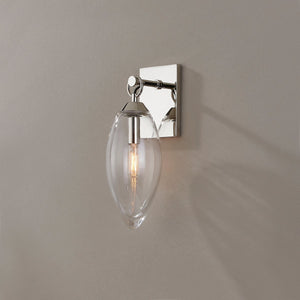 Close-up of the Nantucket Wall Sconce in polished nickel showing the arm curve and shade silhouette.