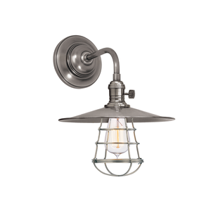 Heirloom Wall Sconce in Aged Brass shown from the front to reveal the arm curve and shade silhouette.