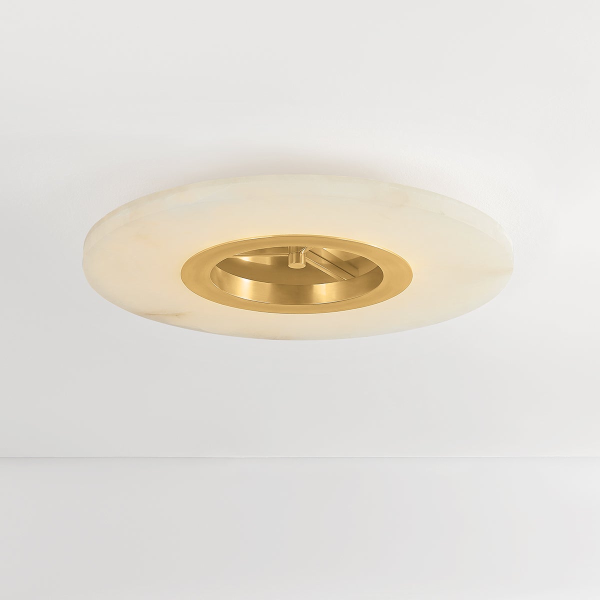 Alto Semi Flush in aged brass shown from the front to reveal the shade profile and mounting canopy.