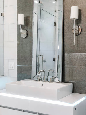 Amherst Wall Sconce 5" in polished nickel shown from the front to reveal the arm curve and shade silhouette.