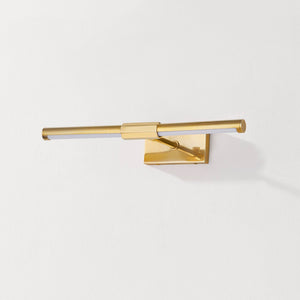 Close-up of the Melbourne Picture Light 16" in aged brass showing the arm curve and shade proportion.
