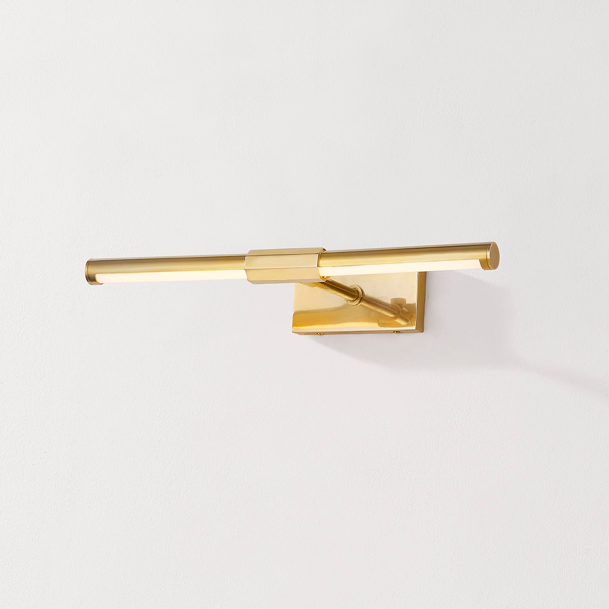 Close-up of the Melbourne Picture Light 16" in aged brass showing the arm curve and shade proportion.