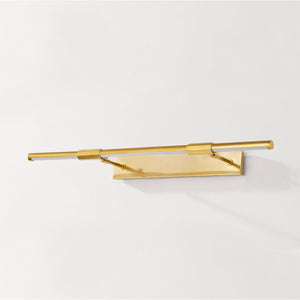 Close-up of the Melbourne Picture Light 30" in aged brass showing the arm curve and shade proportion.