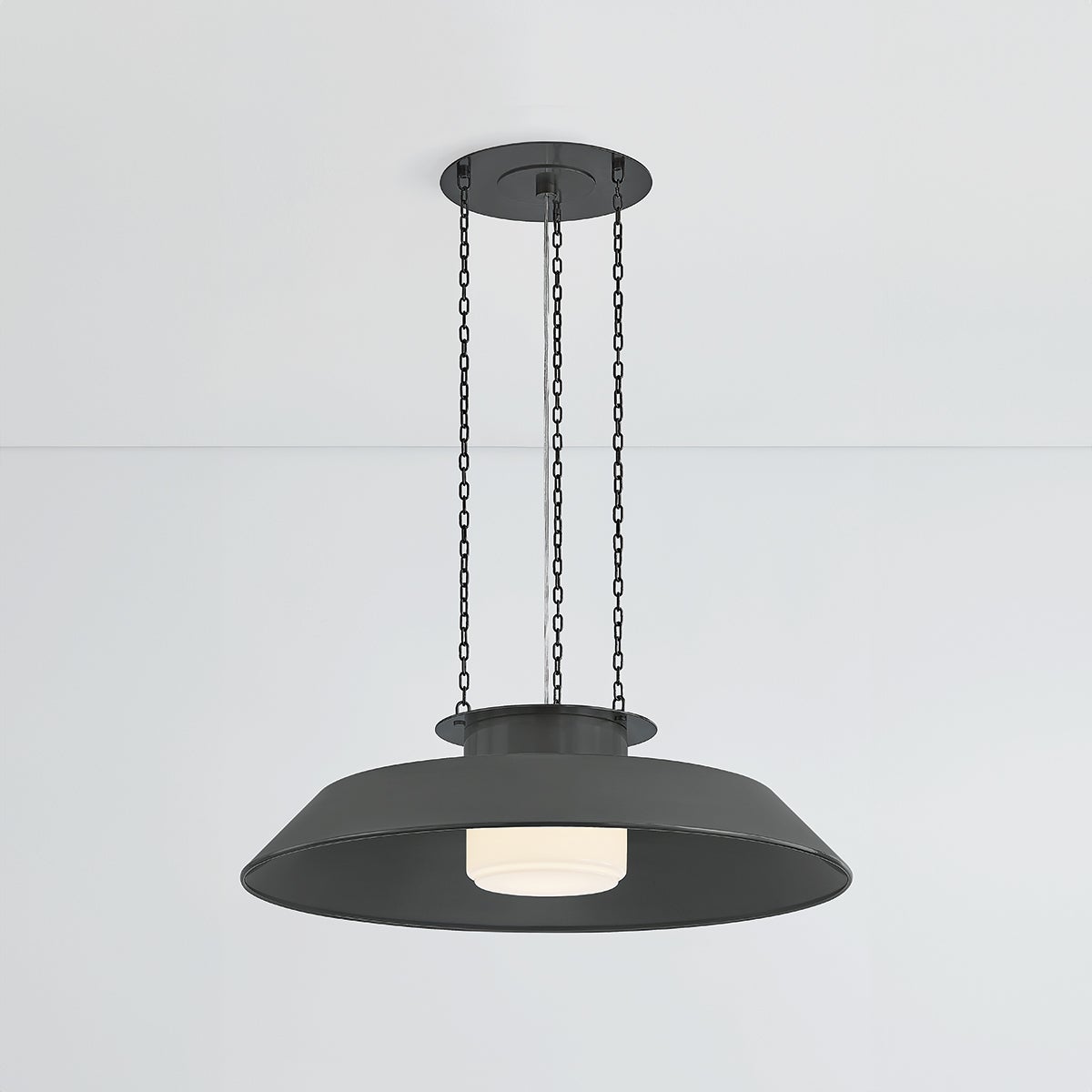 Close-up of the Woodrow Pendant 32" in dark bronze showing the shade shape and metal detail.