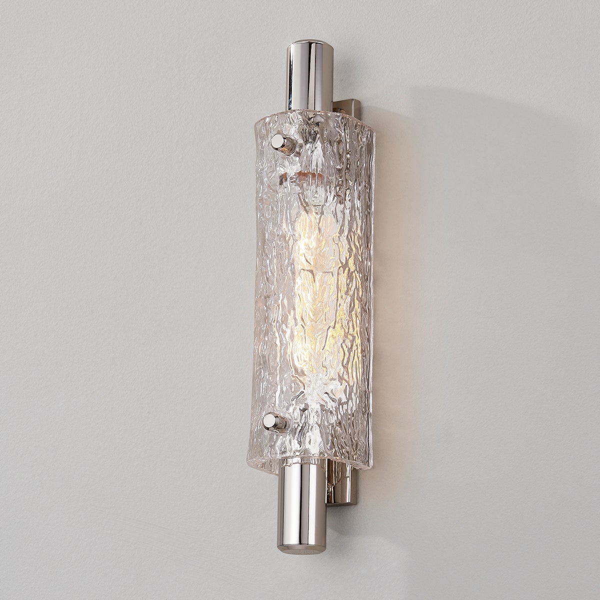 Close-up of the Harwich Wall Sconce 3.5" x 18" in polished nickel showing the arm curve and shade silhouette.