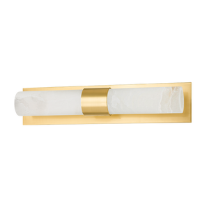 Stowe Wall Sconce in aged brass shown from a second angle to highlight the arm curve and shade silhouette.