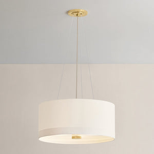 Close-up of the Ashland Pendant 22" in aged brass showing the shade shape and metal detail.
