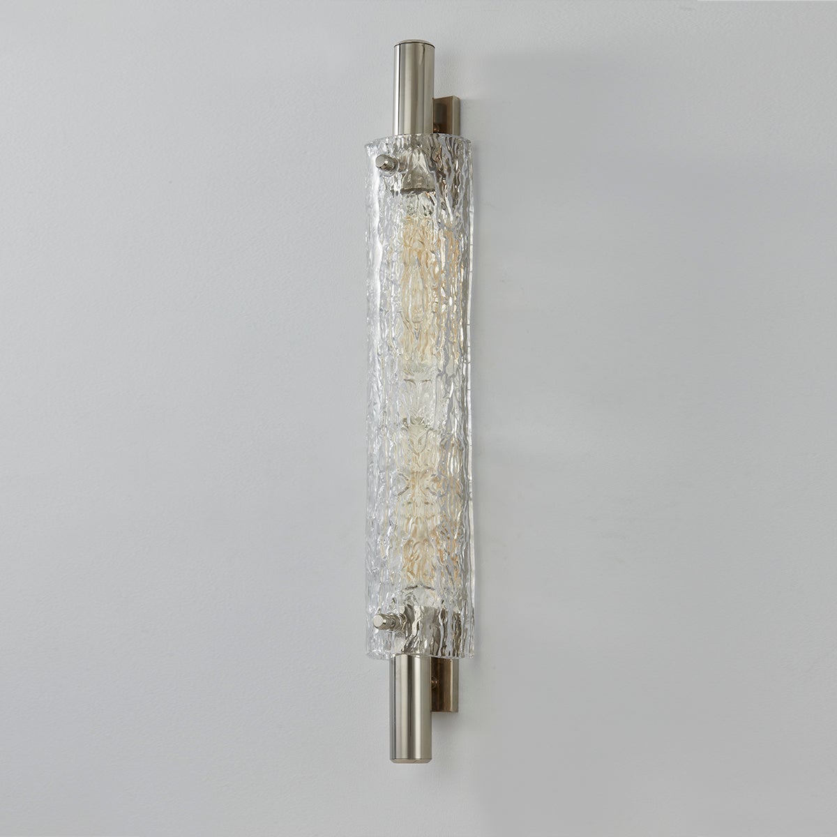 Close-up of the Harwich Wall Sconce 3.5" x 28.75" in polished nickel showing the arm curve and shade silhouette.