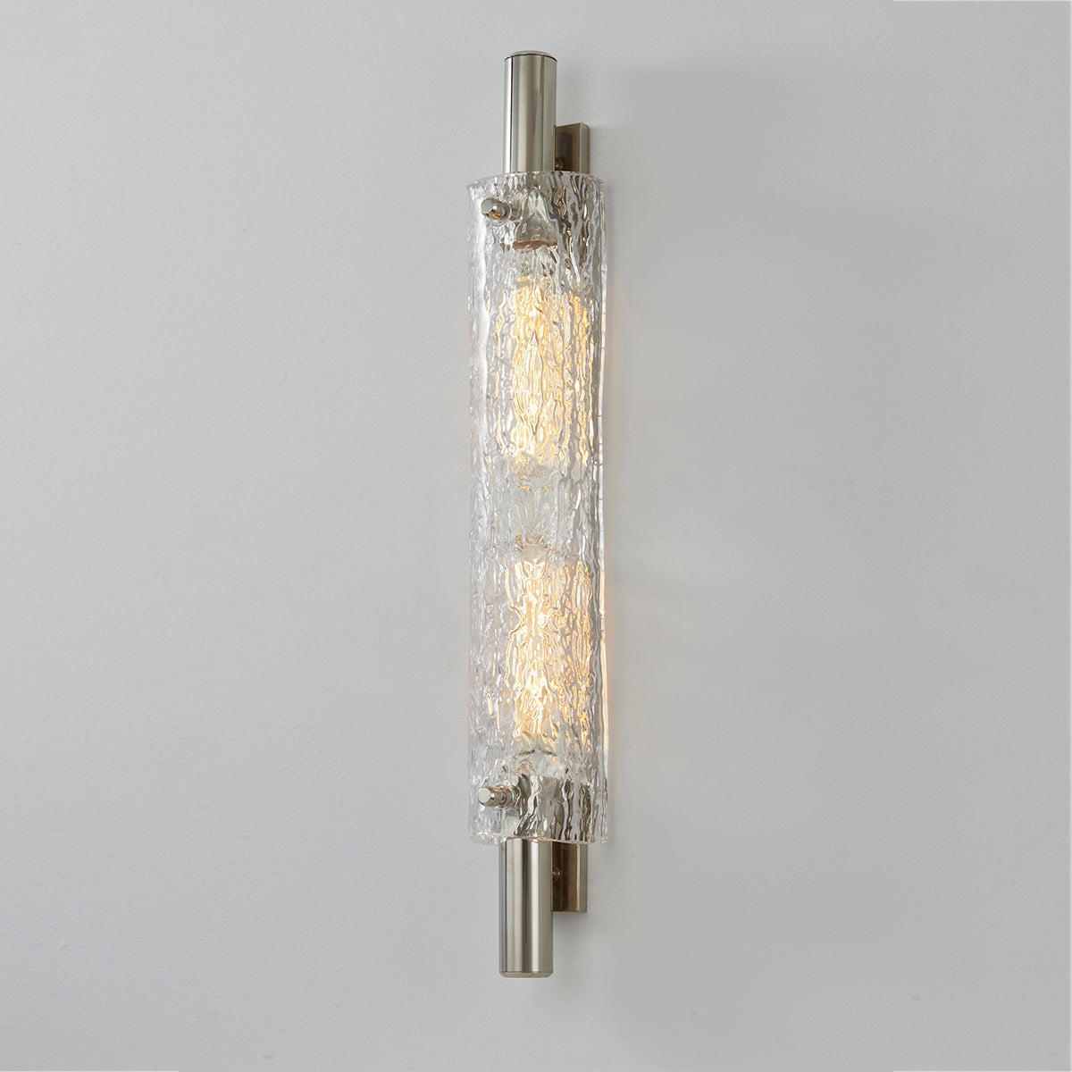 Close-up of the Harwich Wall Sconce 3.5" x 28.75" in polished nickel showing the arm curve and shade silhouette.