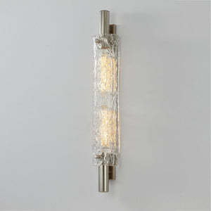 Close-up of the Harwich Wall Sconce 3.5" x 28.75" in polished nickel showing the arm curve and shade silhouette.