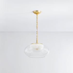 Moore Pendant 17" in aged brass shown from the front to reveal the shade shape and metal detail.
