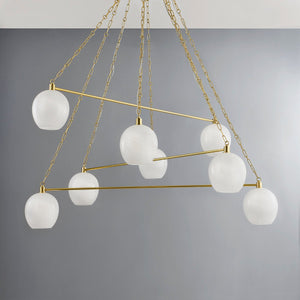 Asbury Park Chandelier 54.5" in aged brass shown from a second angle to highlight the frame, arms, and shade detail.