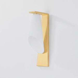Andros Wall Sconce in aged brass shown from the front to reveal the arm curve and shade silhouette.
