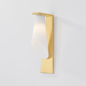 Close-up of the Andros Wall Sconce in aged brass showing the arm curve and shade silhouette.