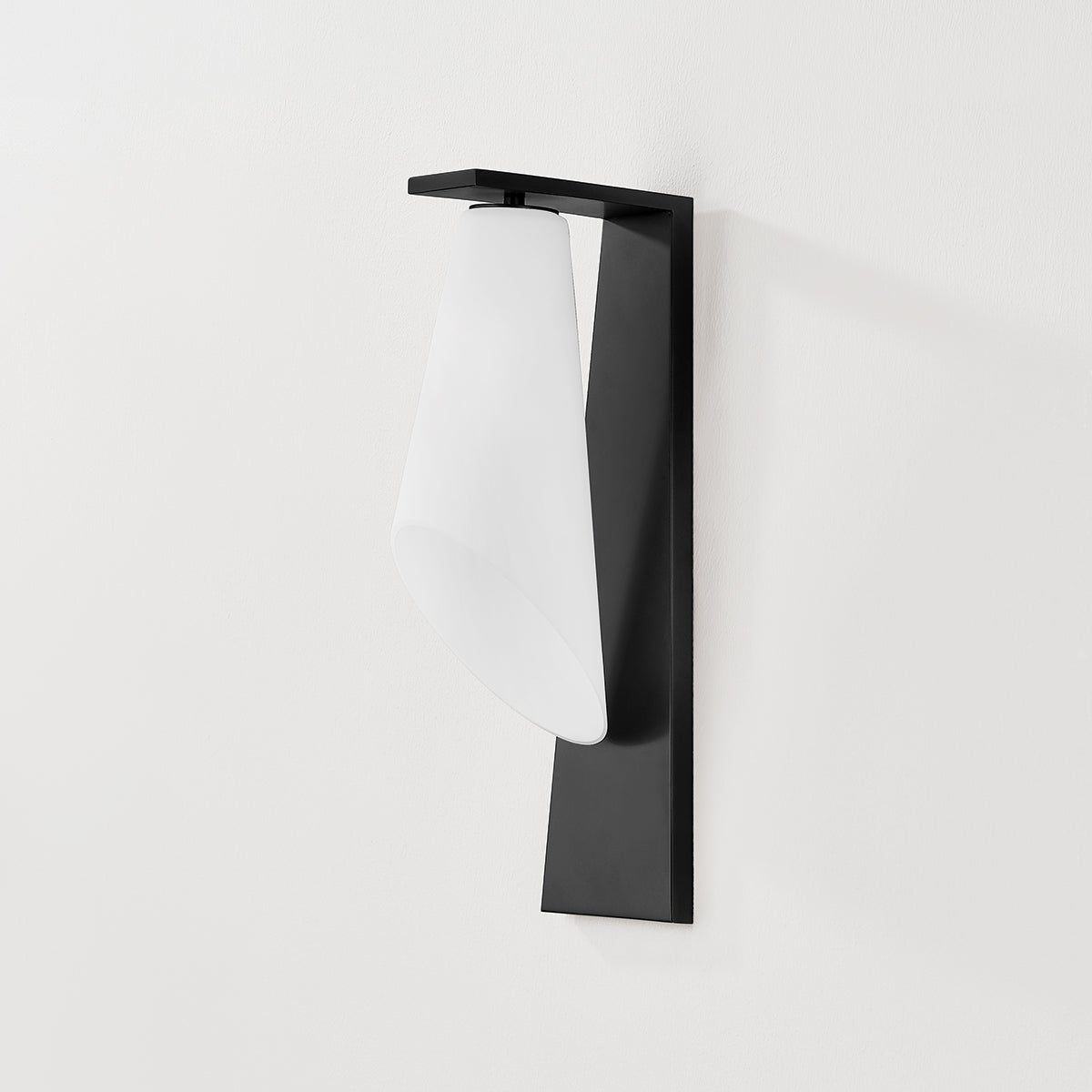 Close-up of the Andros Wall Sconce in bronze showing the arm curve and shade silhouette.