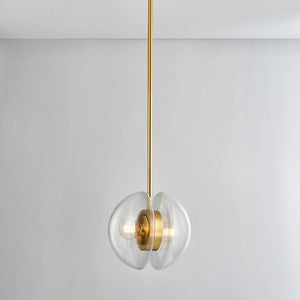 Close-up of the Kert Pendant 11.75" in aged brass showing the shade shape and metal detail.