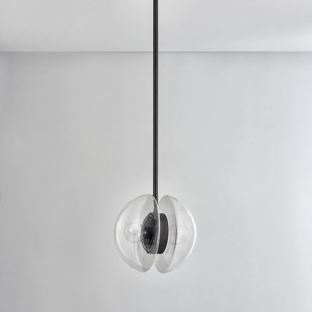 Close-up of the Kert Pendant 11.75" showing the shade shape and metal detail.