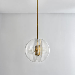 Kert Pendant 17" in aged brass shown from the front to reveal the shade shape and metal detail.