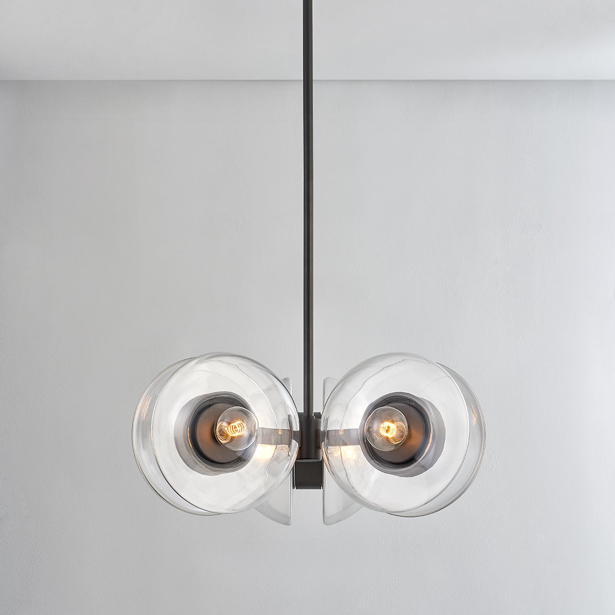 Close-up of the Kert Chandelier 27" showing the frame, arms, and shade detail.