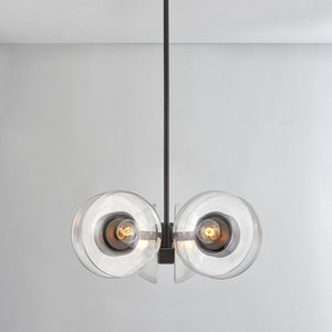 Close-up of the Kert Chandelier 27" showing the frame, arms, and shade detail.
