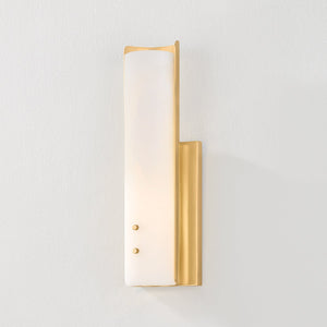 Close-up of the Lucio Wall Sconce 4.25" x 14.5" in aged brass showing the arm curve and shade silhouette.