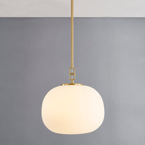 Ingels Pendant 16" in aged brass shown from the front to reveal the shade shape and metal detail.