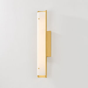 Close-up of the Lucio Wall Sconce 4.25" x 22.5" in aged brass showing the arm curve and shade silhouette.