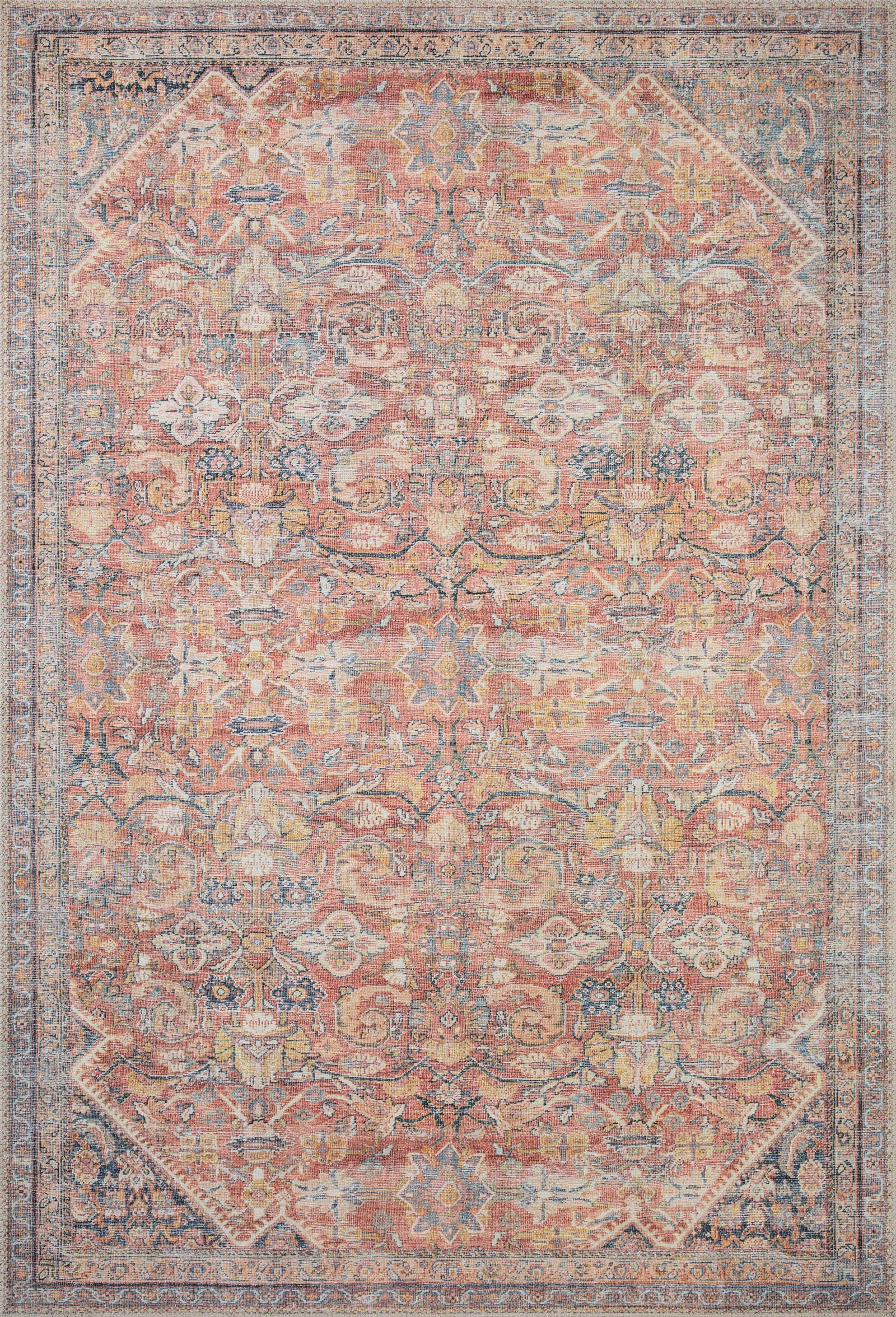 Adrian Rust / Denim — a Loloi rug at Laurie Yapp Home.