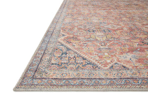 Side view of the Adrian Rust / Denim rug.