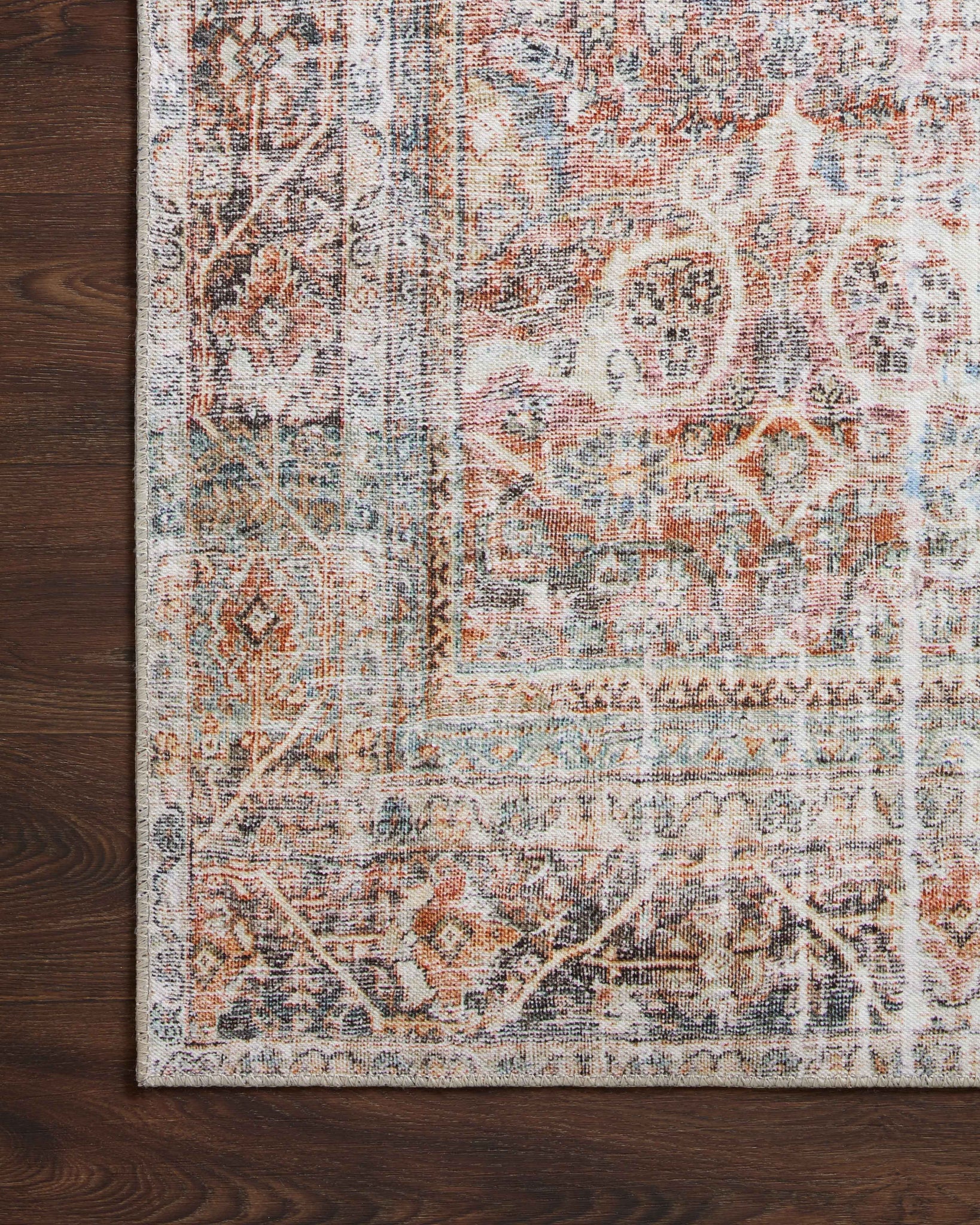 Adrian Sunset / Charcoal shown in a curated living room setting at Laurie Yapp Home.