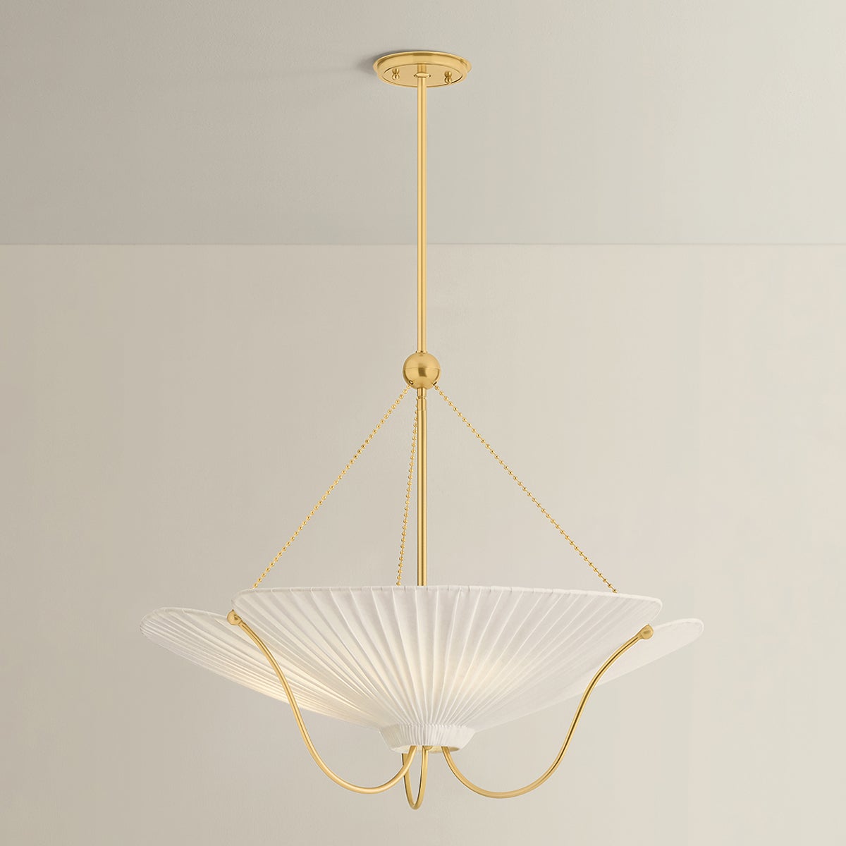 Close-up of the Gerhard Pendant in aged brass showing the shade shape and metal detail.