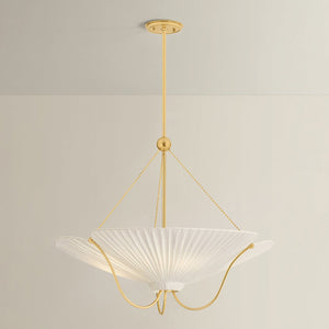 Close-up of the Gerhard Pendant in aged brass showing the shade shape and metal detail.