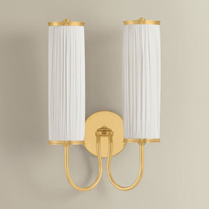 Elaine Wall Sconce in aged brass shown from a second angle to highlight the arm curve and shade silhouette.
